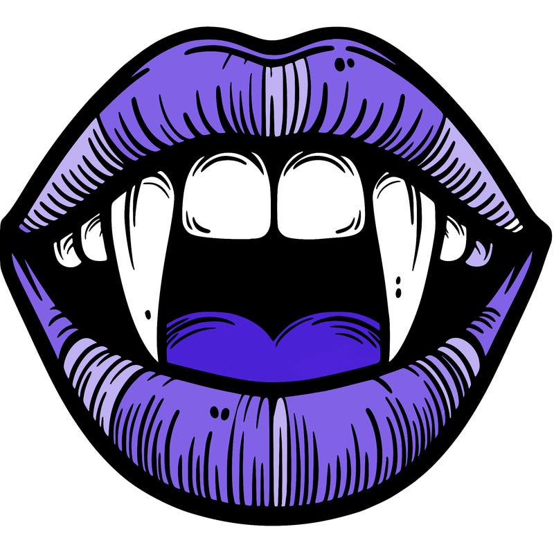lips with vampire teeth