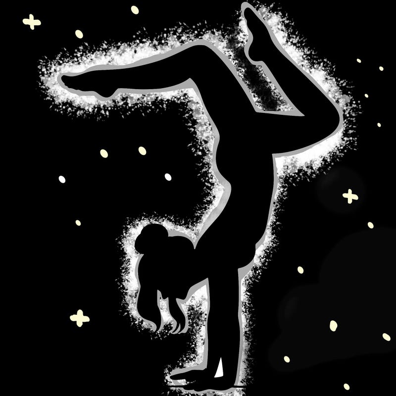 a woman doing a handstand