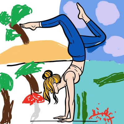 a woman doing a handstand