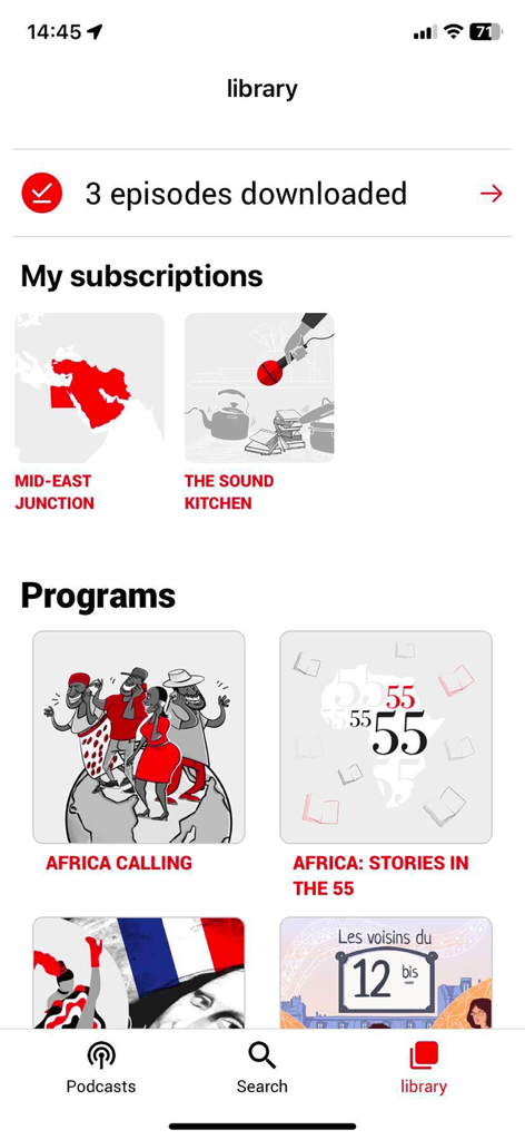 RFI Pure radio app library section showing downloaded episodes and subscribed podcasts.
