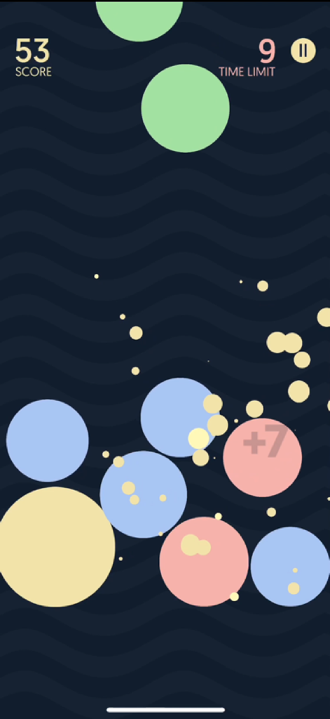 Gameplay of Dream Bubblez showing colorful pastel bubbles and a score counter on a dark wavy background.