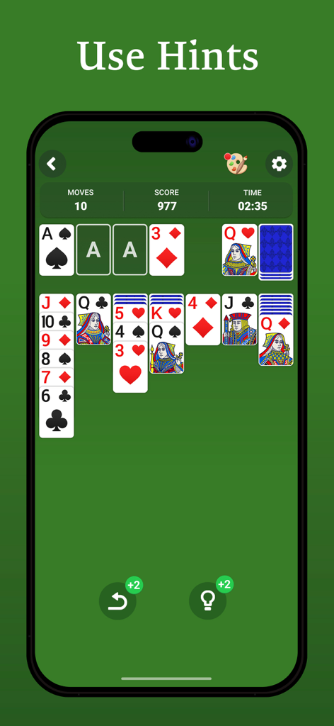 A mobile phone screen showing a classic solitaire card game with a hint feature button