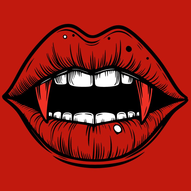 lips with vampire teeth
