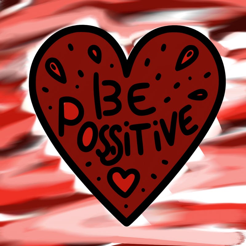 a out line of a heart that says be positive