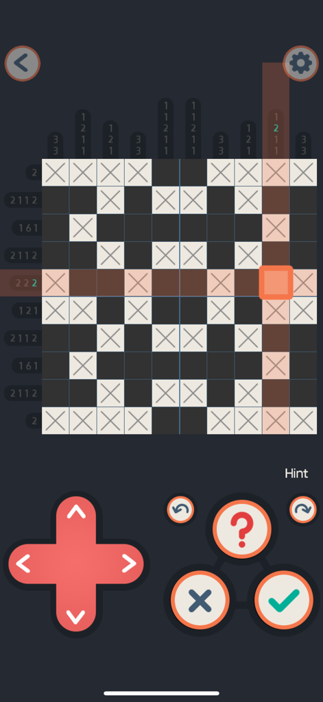 Gameplay di No2g Nonogram che mostra un puzzle a griglia 10x10 con un controllo joypad virtuale.
