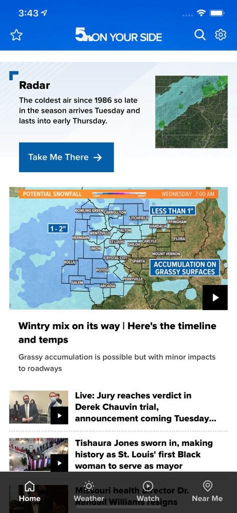 St. Louis News from KSDK - St. Louis news and weather app interface showing a snowfall forecast map and local headlines.