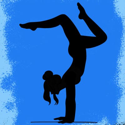 a woman doing a handstand
