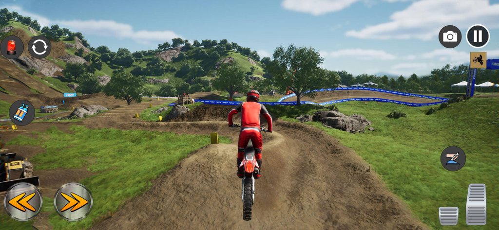 Motocross Mad Bike MX Racing - A third-person gameplay view of a motocross rider on a red dirt bike navigating an off-road track in a hilly green landscape.