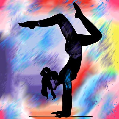 a woman doing a handstand