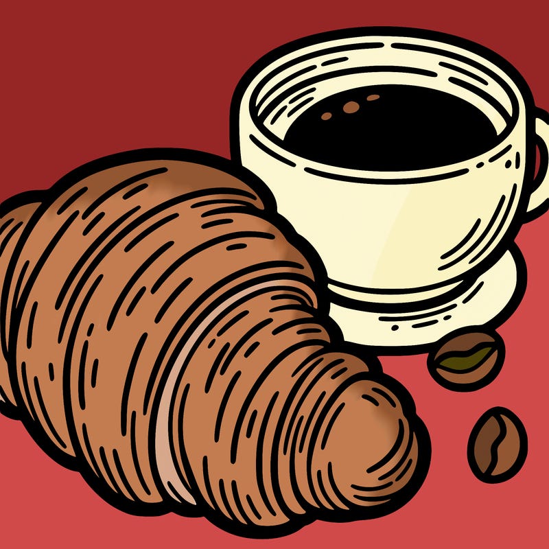 a croissant with a cup of coffee