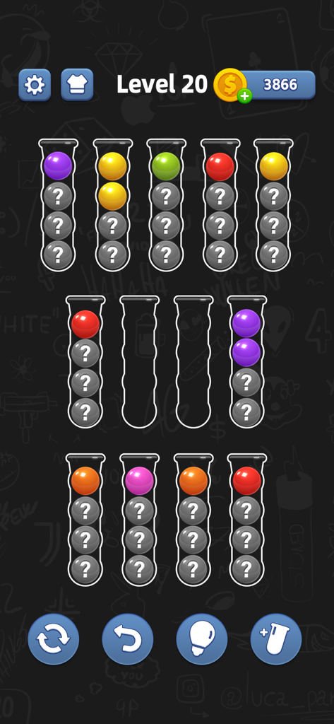 Ball Sort puzzle game interface showing colored balls and hidden items in test tubes