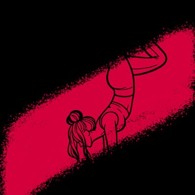 a woman doing a handstand