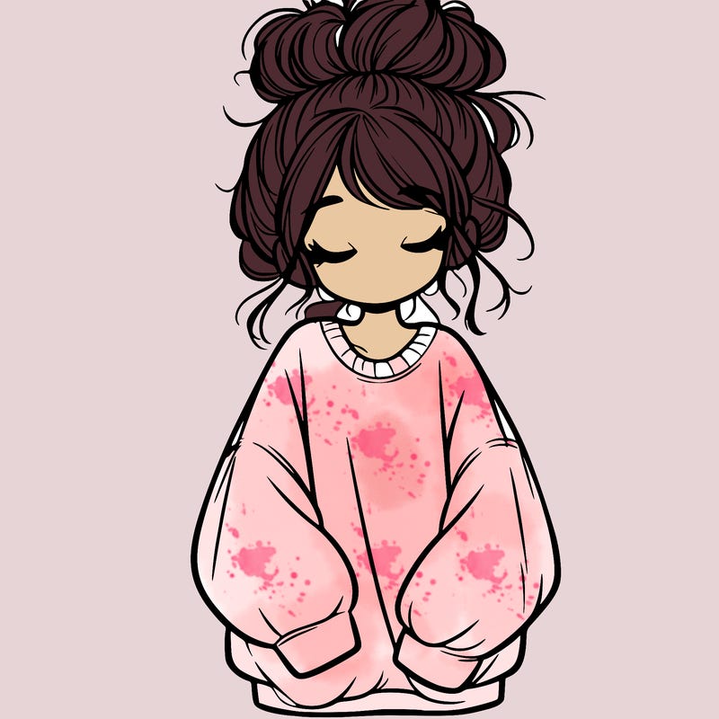 girl with baggy sweatshirt and messy bun