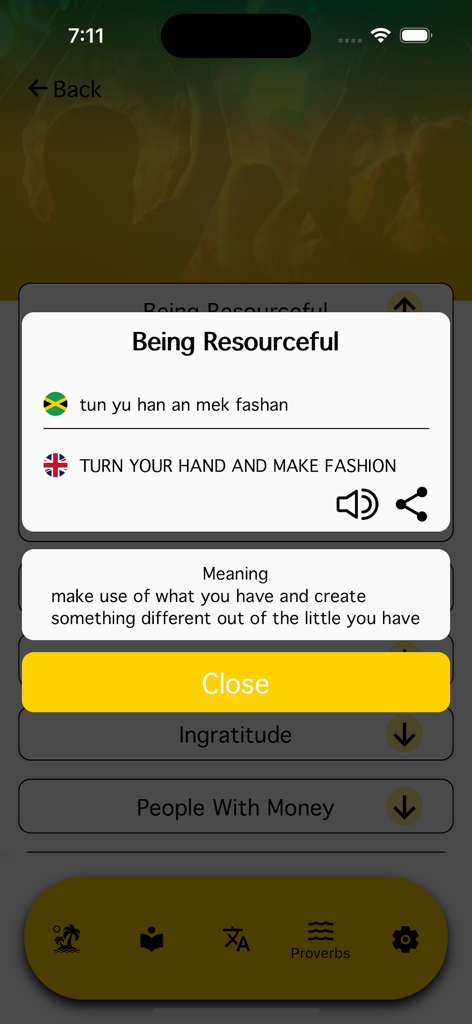 Una captura de pantalla de la aplicación JamrAAk que muestra un proverbio jamaicano con su traducción al inglés y su significado cultural