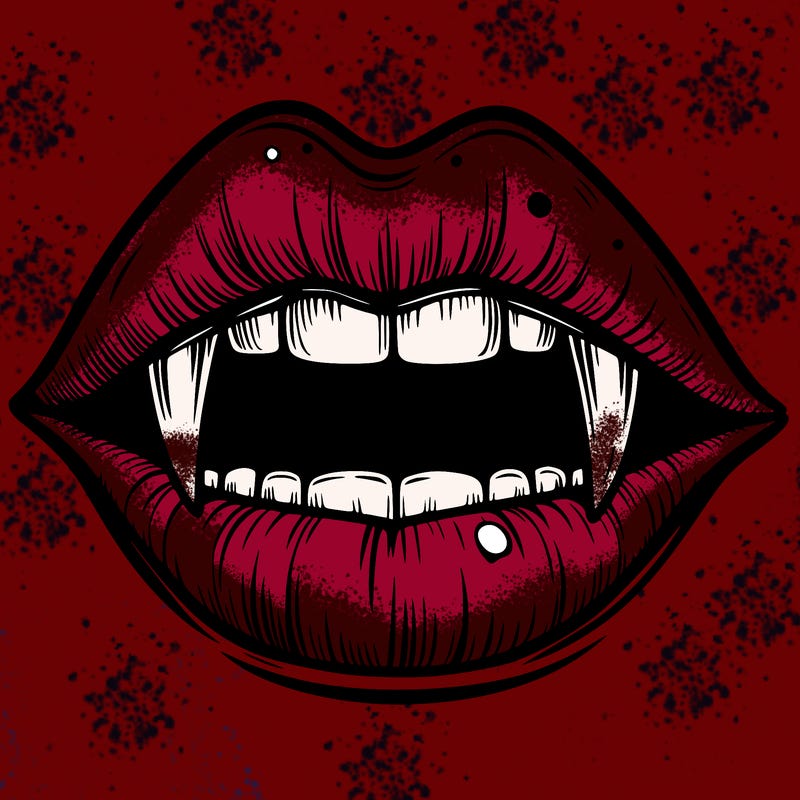 lips with vampire teeth