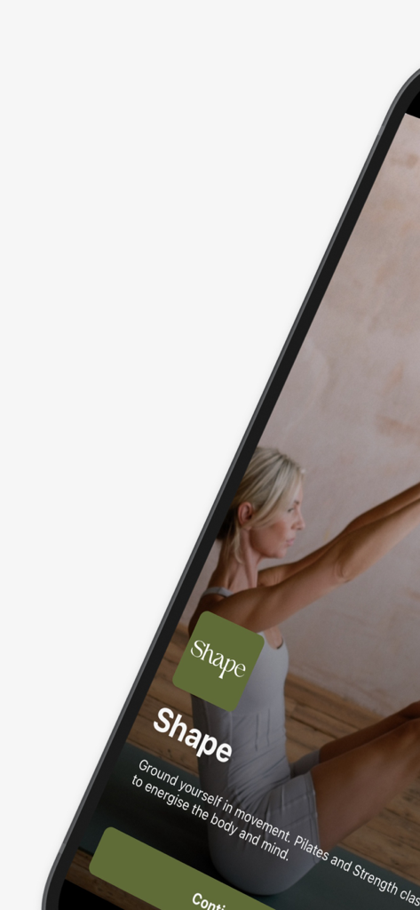 Woman performing pilates on the Shape Pilates London app screen