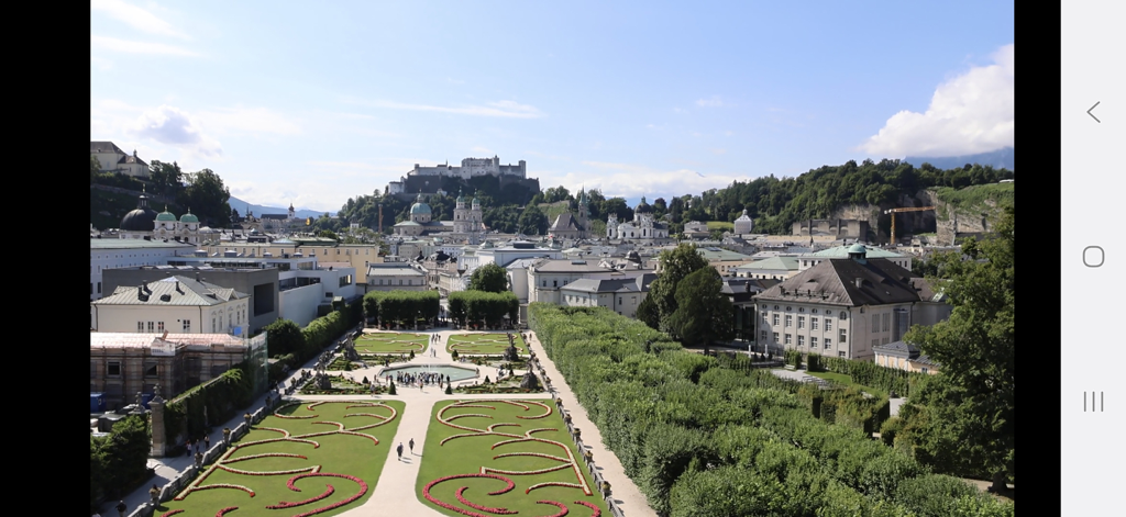 High quality live webcam stream of Salzburg Austria featuring Mirabell Gardens and the fortress in landscape mode