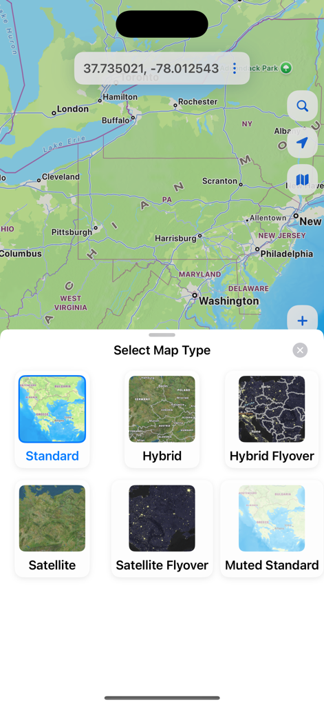 The map type selection interface in the GPS Coordinates Locator app showing standard hybrid and satellite view options