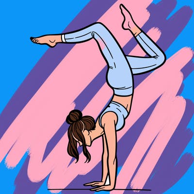 a woman doing a handstand