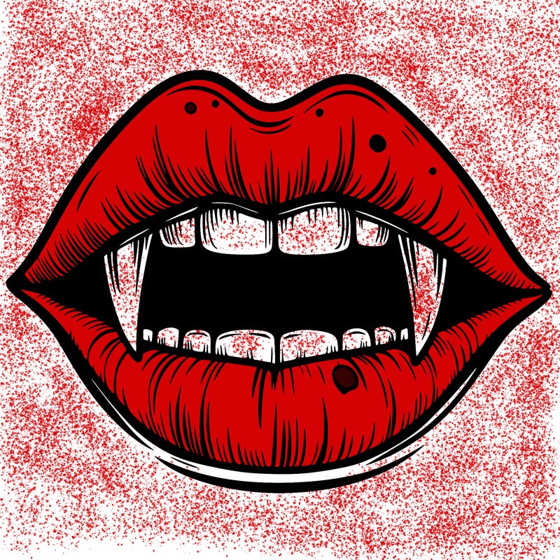 lips with vampire teeth