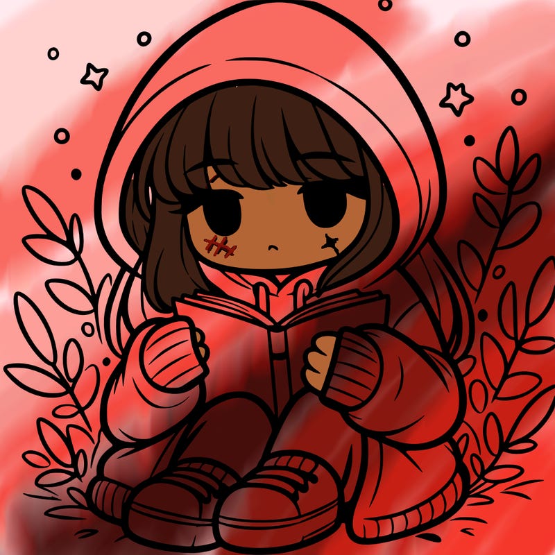 girl in oversized hoodie reading a book
