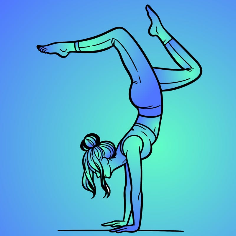 a woman doing a handstand