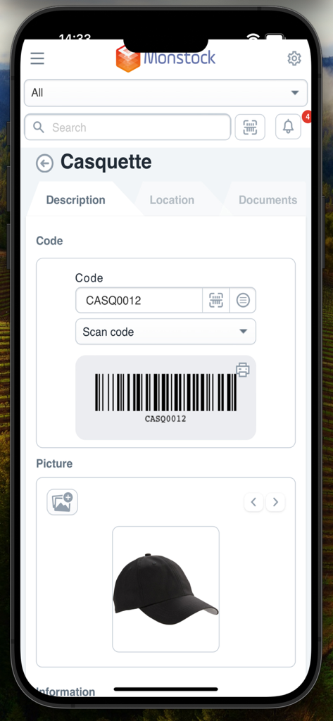 Monstock - Monstock mobile app interface displaying product details for a black cap including its barcode and image for inventory tracking