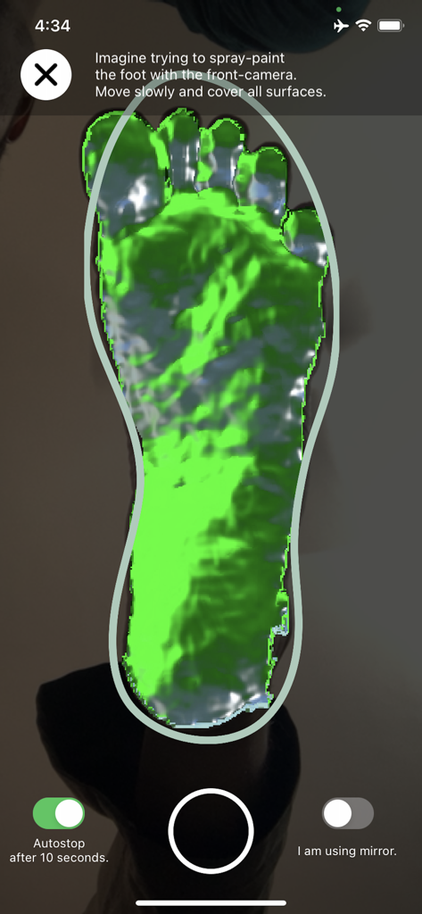 ped3D mobile - Ein mobiler Bildschirm, der den 3D-Scanvorgang eines Fußes mit einer grünen digitalen Überlagerung zur Verfolgung der Oberflächenabdeckung zeigt