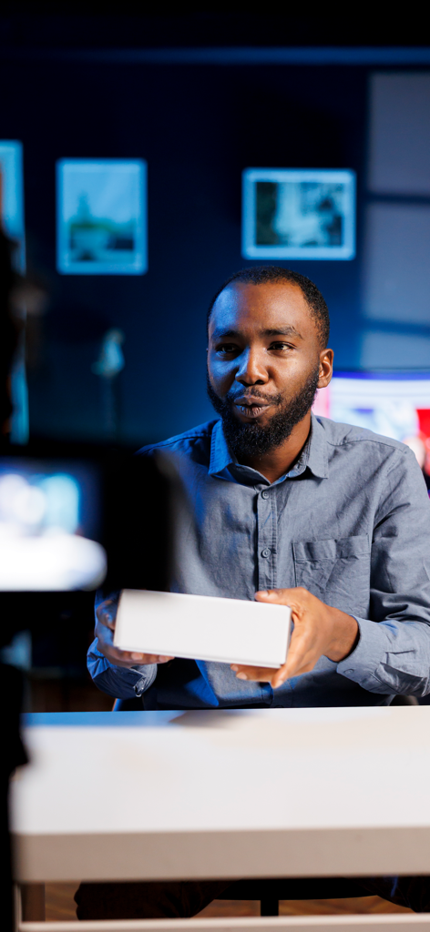 Teleprompter & Script Reader - A content creator recording a professional video in a studio environment