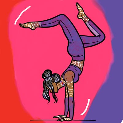 a woman doing a handstand