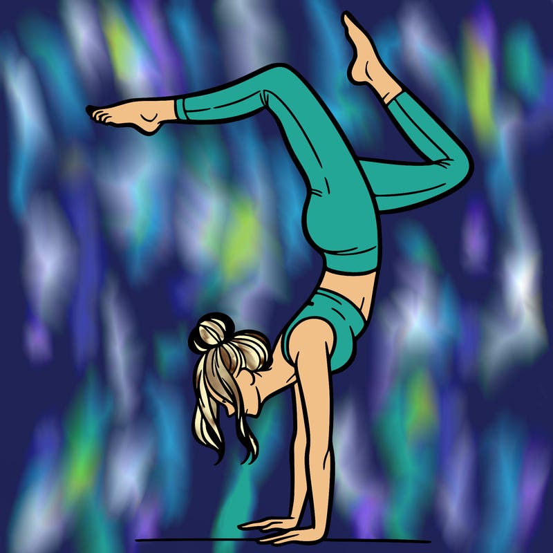 a woman doing a handstand