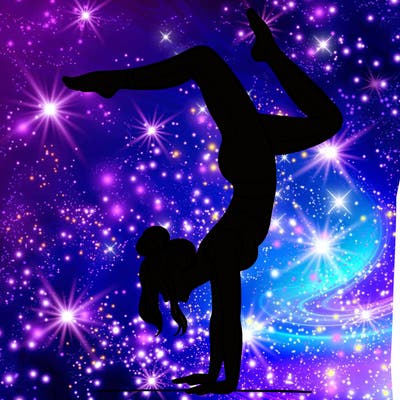 a woman doing a handstand