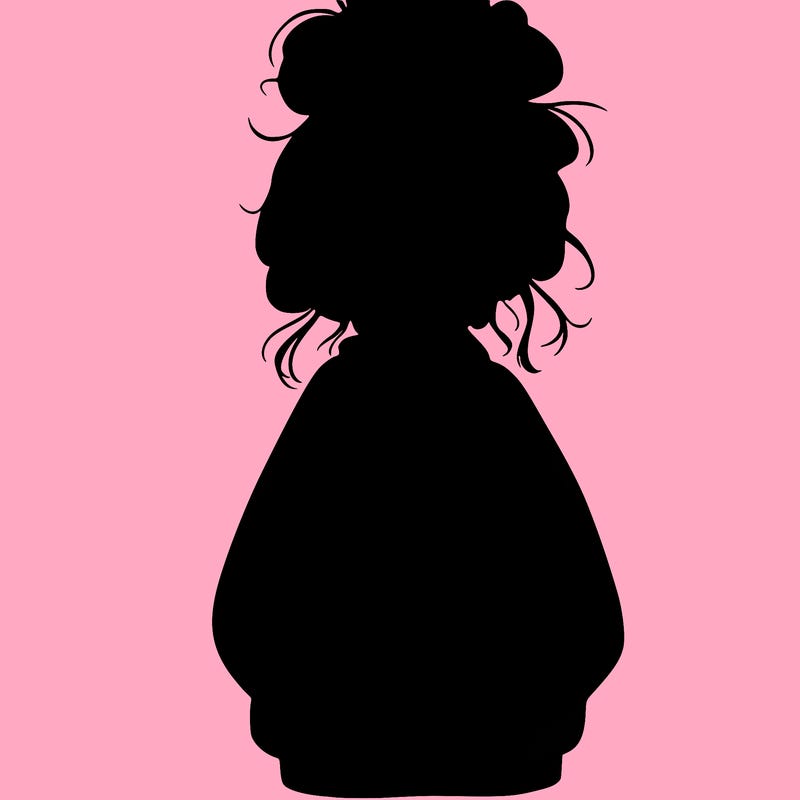 girl with baggy sweatshirt and messy bun