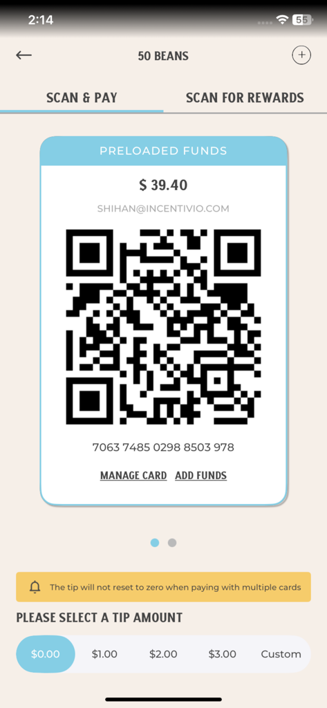 Tela de escaneamento e pagamento do aplicativo móvel The Human Bean mostrando um código QR para fundos pré-carregados e opções de seleção de gorjeta