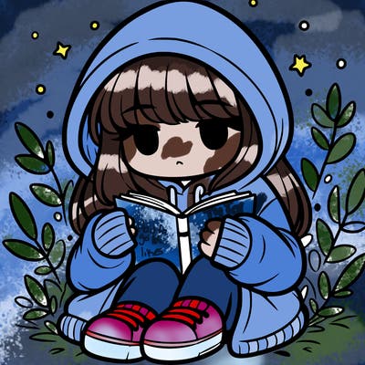 girl in oversized hoodie reading a book