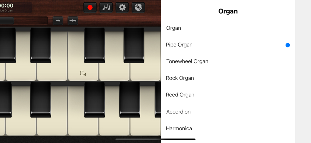 Keys: Organ, Piano, Percussion - Instrument selection menu in the Keys app showing various types of organs like pipe organ and accordion