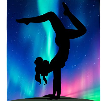 a woman doing a handstand