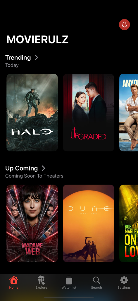 Home screen of the MovieRulz app showing trending and upcoming movies with a dark interface and high-quality posters