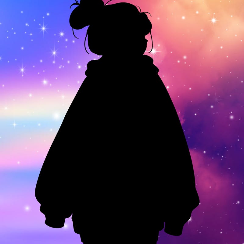 realistic girl with a oversized sweatshirt on and a bun