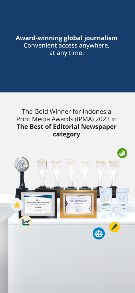 Display of journalism awards for Kompas.id including the IPMA 2023 Gold Winner trophy