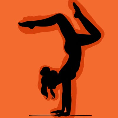 a woman doing a handstand
