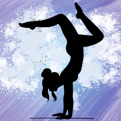 a woman doing a handstand