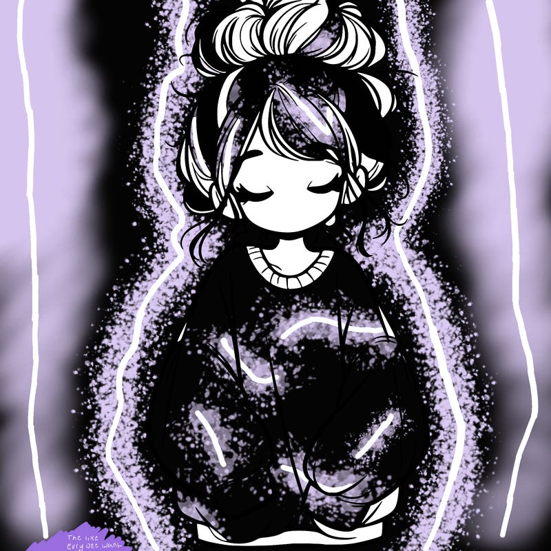 girl with baggy sweatshirt and messy bun