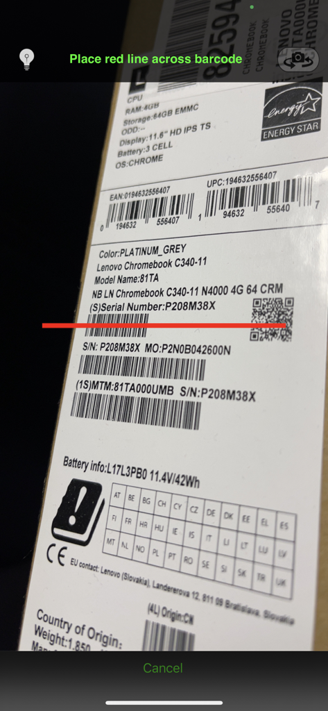 Professional barcode scanner app interface scanning a product serial number and QR code on a box