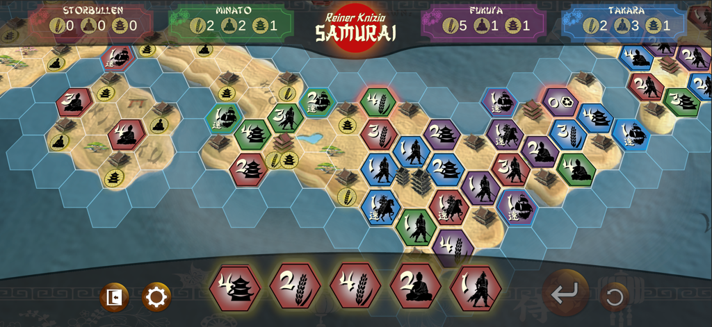 Samurai by Reiner Knizia - Gameplay de Samurai par Reiner Knizia montrant une carte hexagonale et des tuiles stratégiques dans le Japon féodal.