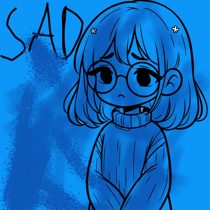 sad girl with glasses in a sweater