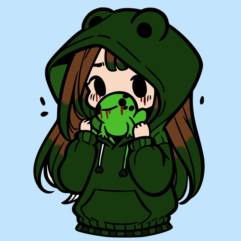 a girl holding a froggy hoodie