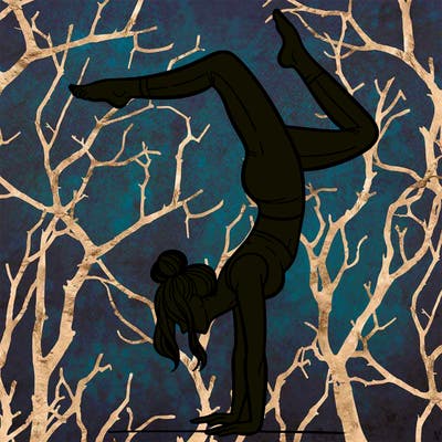 a woman doing a handstand