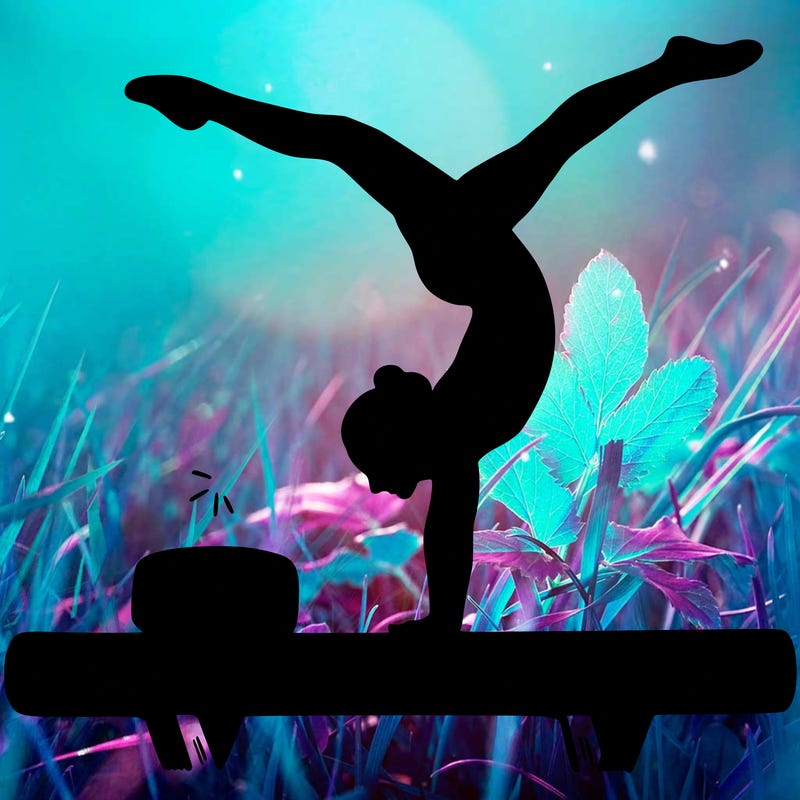 female gymnast, doing acrobatic handstand on balance beam