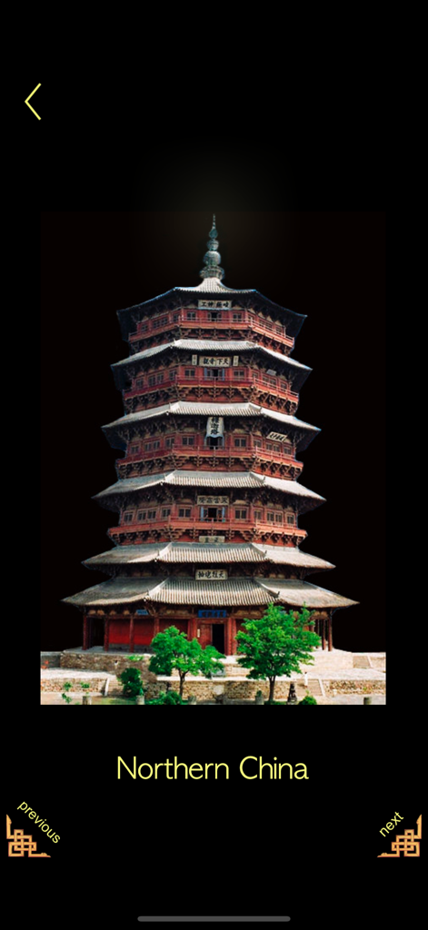 Buddha - Magic Prayer Wheel ! - A multi-tiered traditional wooden Buddhist pagoda from Northern China against a black background